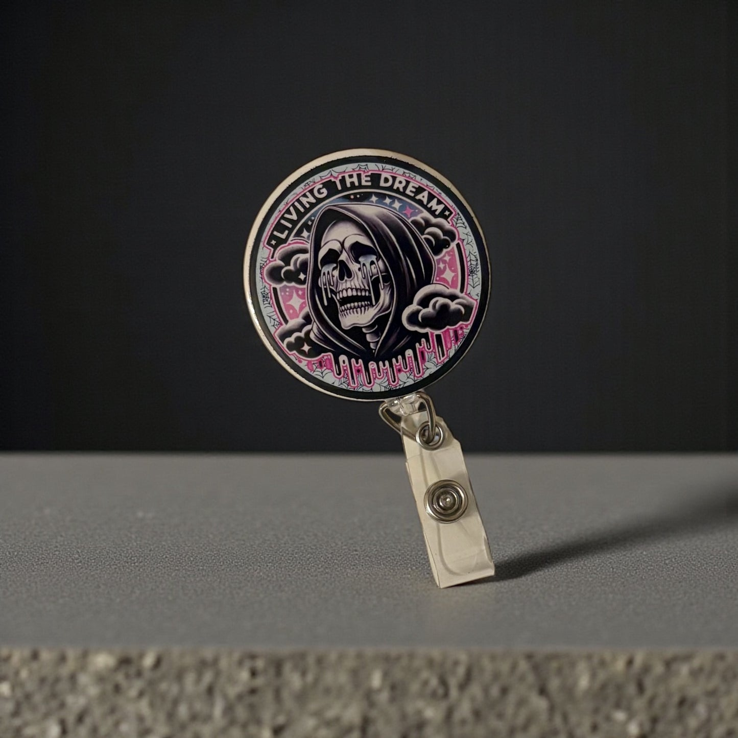 Living the Dream Badge Reel – Funny Skeleton Retractable ID Holder with Pink Drip Design
