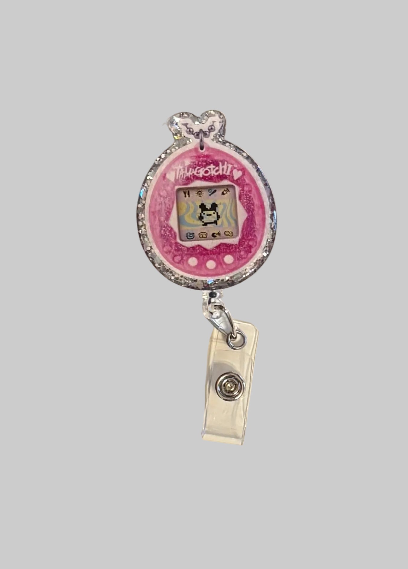 Tamagotchi-Inspired Retro Badge Reel