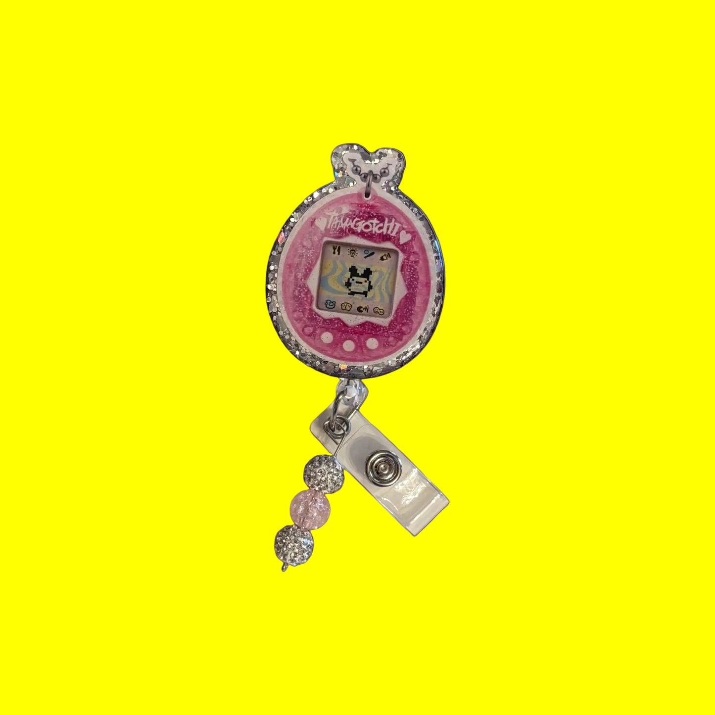 Tamagotchi-Inspired Retro Badge Reel