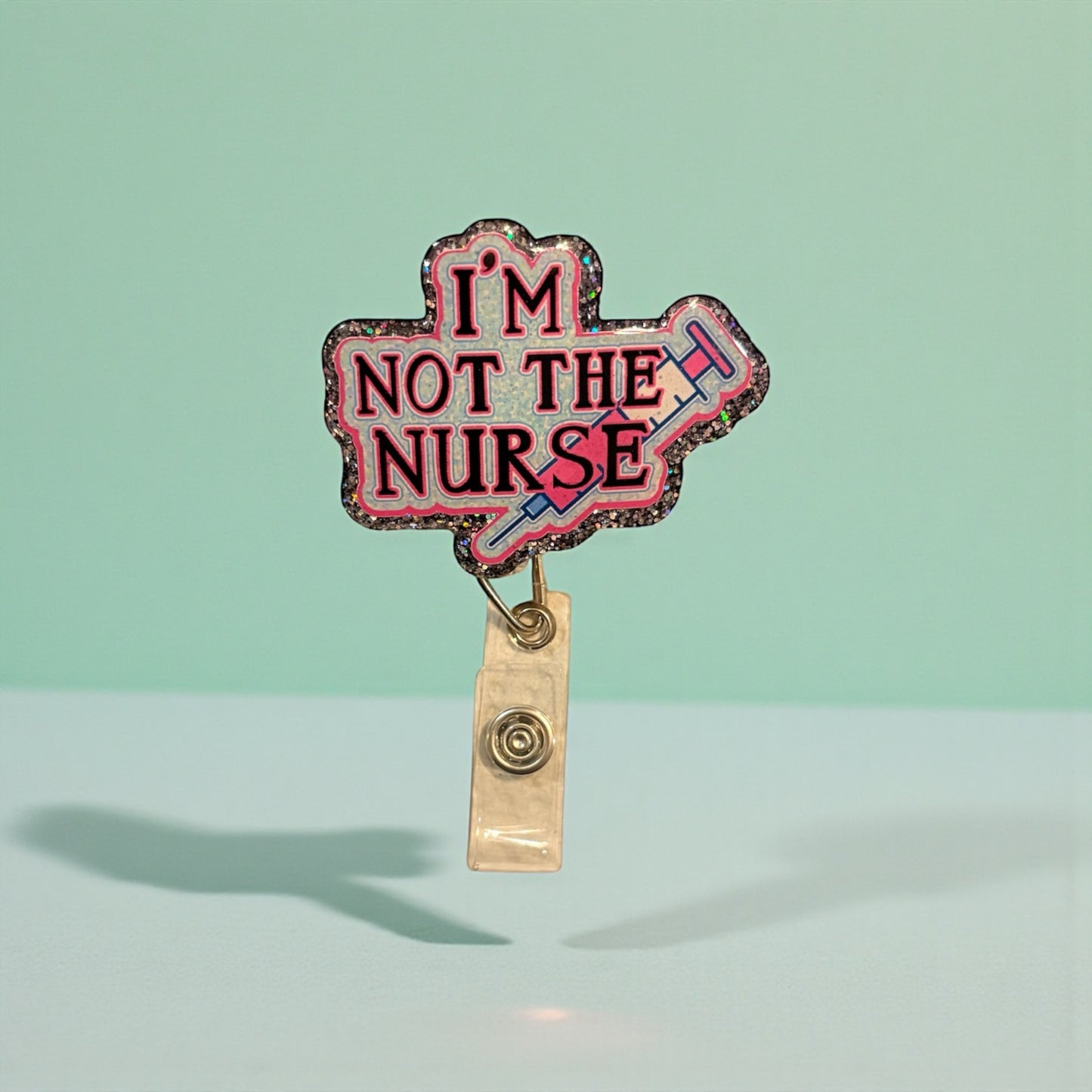 Funny “I’m Not the Nurse” Badge Reel – Medical Staff ID Clip – Hospital Humor – CNA MA Tech Badge – Healthcare Accessory Gift