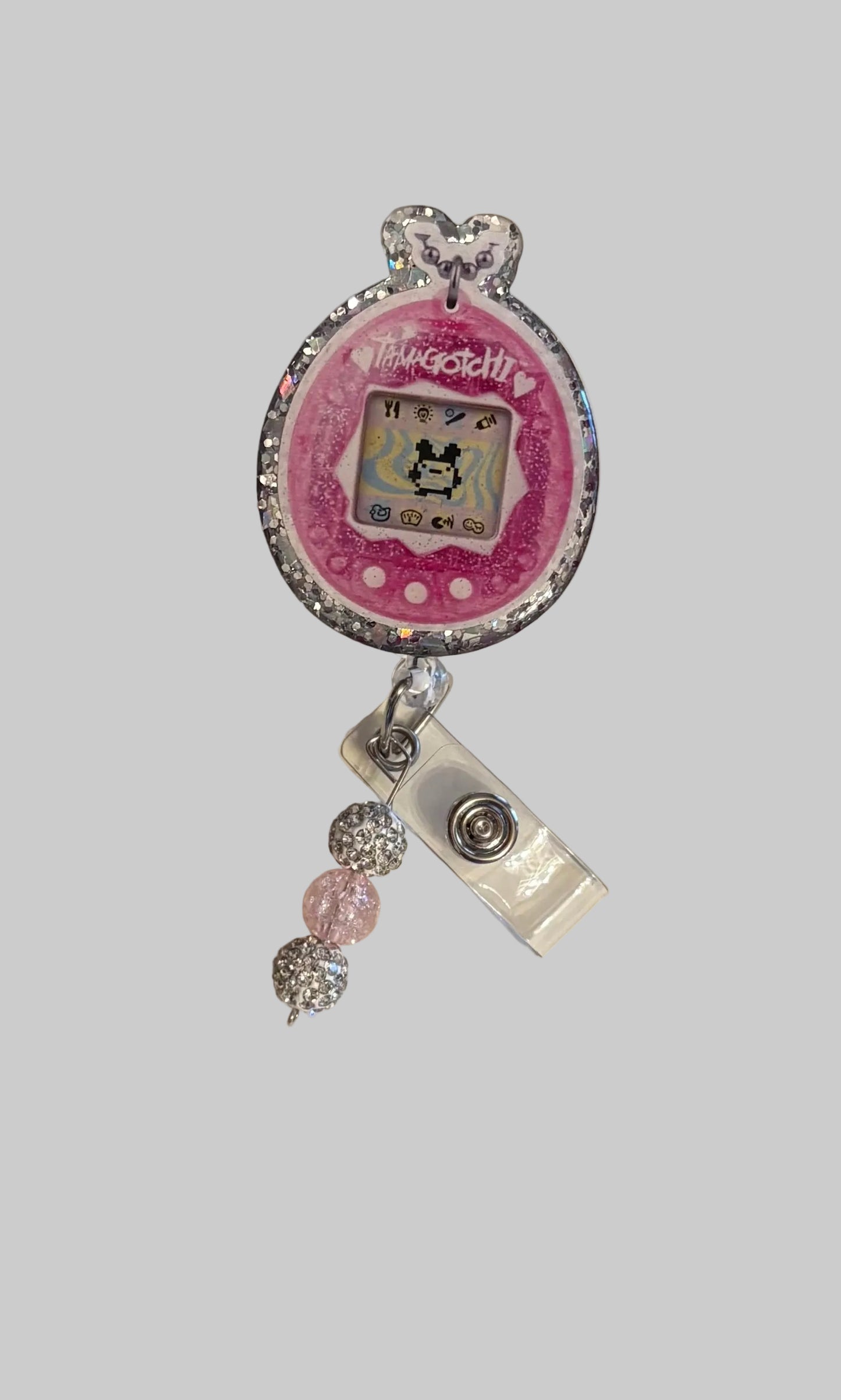 Tamagotchi-Inspired Retro Badge Reel