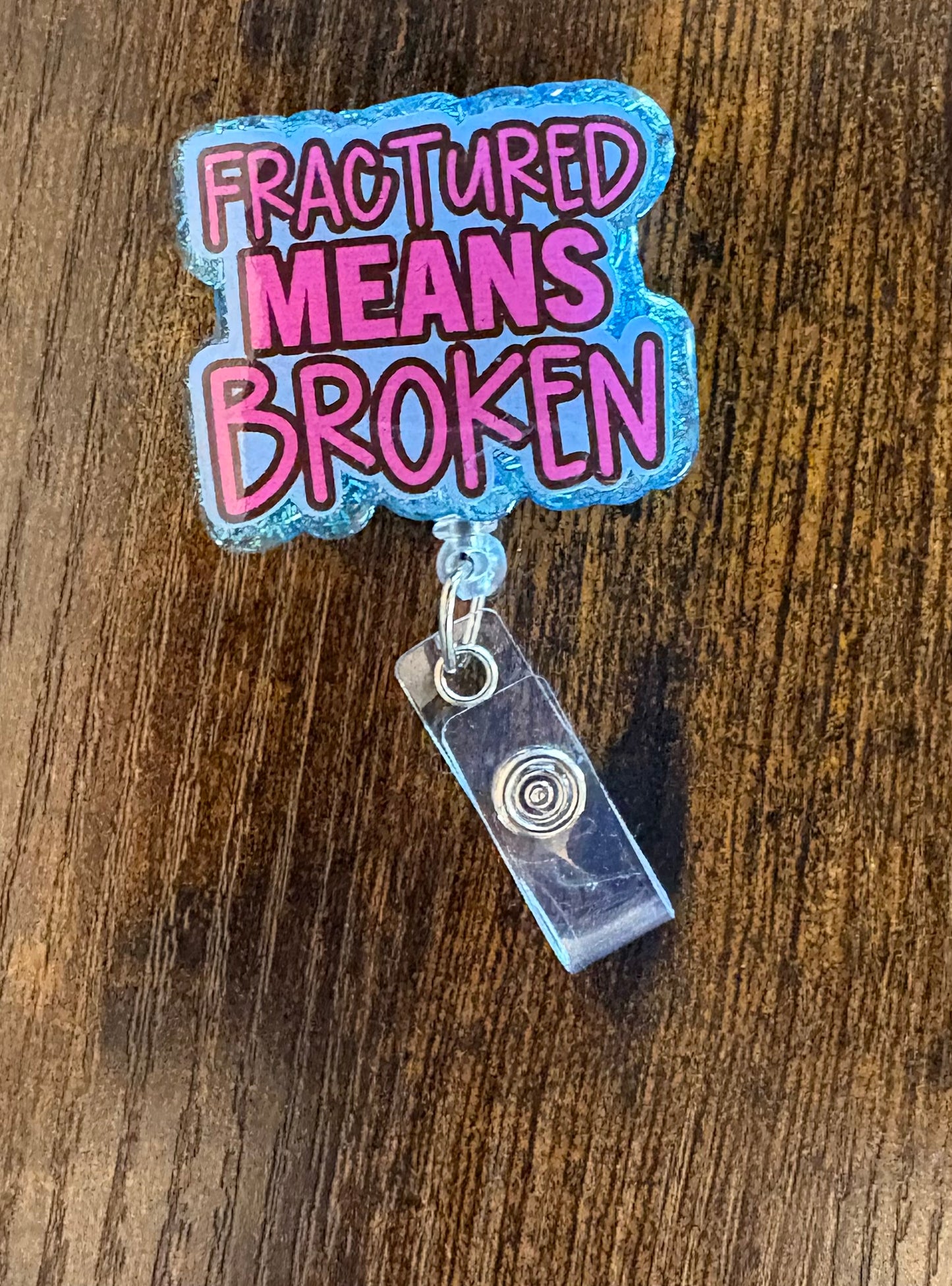 Fractured Means Broken Badge Reel | Funny Medical Badge Holder for Nurses, Doctors & Healthcare Workers