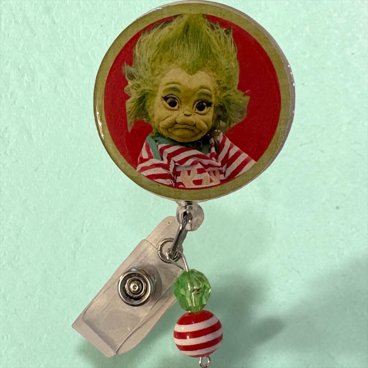 Baby Grinch Retractable Badge Reel – Whimsical Green Furry Holiday ID Badge Holder for Nurses, Teachers & Healthcare Workers