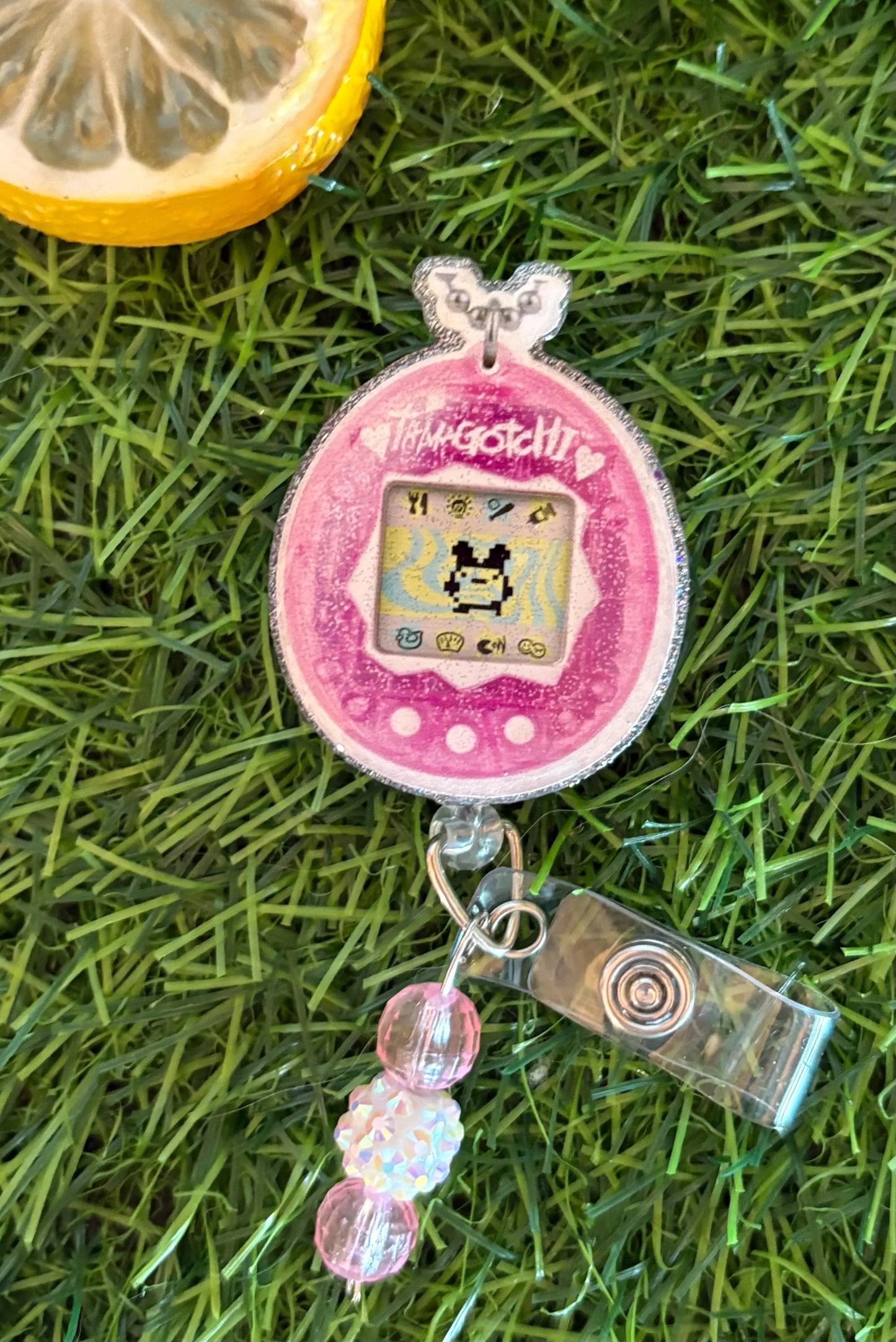 Tamagotchi-Inspired Retro Badge Reel